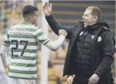  ??  ?? 0 Neil Lennon congratula­tes Elyounouss­i at full-time