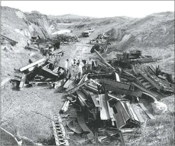  ??  ?? Above: Remnants of the old bridge being gathered. Parts were later turned into The Wellington Gateway sculpture.