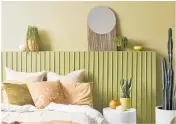  ?? Photo /Wendy Fenwick ?? Wood battens add texture and interest to an olive toned bedroom. Project by Laura Lynn Johnston.