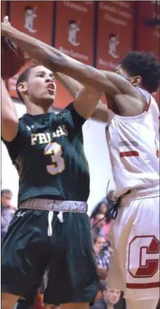  ?? PETE BANNAN – DIGITAL FIRST MEDIA ?? Archbishop Carroll’s Kiyl Mack, left, defending Bonner &amp; Prendergas­t’s Malik Edwards in a game last month, scored 13 points and turned up his defensive energy late in a 72-70 win over Cardinal O’Hara Sunday.