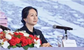  ?? Photograph: AFP/Getty Images ?? The Huawei chief financial officer, Meng Wanzhou, delivers a speech at its annual report press conference in Shenzhen, China.