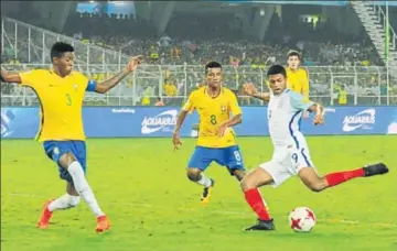  ?? SAMIR JANA/HT PHOTO ?? England striker Rhian Brewster (No 9) shut the door on Brazil in the first semifinal at the Salt Lake Stadium in Kolkata on Wednesday.