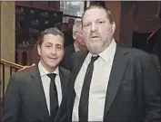  ?? Michael Kovac WireImage ?? DAVID GLASSER, left, then chief operating officer of Weinstein Co., with Harvey Weinstein in 2014.