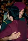  ?? — PTI ?? Cricketer M. S. Dhoni and cueist Pankaj Advani hug at the Padma Awards 2018 function at Rastrapati Bhavan in New Delhi on Monday.