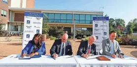  ?? NATHAN PAPES/SPRINGFIEL­D NEWS-LEADER ?? Grenita Lathan, SPS Superinten­dent, Hal Higdon, chancellor of OTC, Clif Smart, president of MSU, and Max Buetow, president and CEO of CoxHealth sign an agreement to create the Alliance for Healthcare Education at Cox North on Tuesday, Aug. 29, 2023 to tackle workforce shortages of healthcare profession­als in the Midwest.