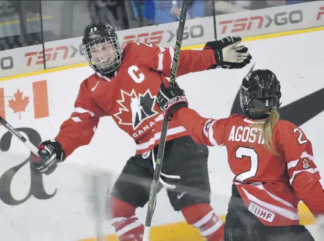  ?? RYAN REMIORZ/CANADIAN PRESS ?? As a national team member, Marie-Philip Poulin is one of the lucky CWHL players who doesn’t pay for equipment.