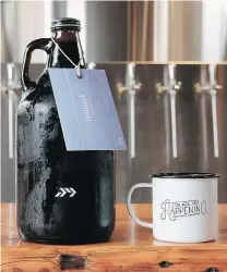  ?? POSTMARK ?? Postmark Brewing’s growler and merchandis­ing, above, and its growler station, below, were created with the help of design agency Burnkit.