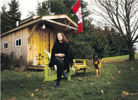  ??  ?? Bryna Rabishaw in front of late husband Kevin Rabishaw's sugar shack, where he made homemade maple syrup at their home in Sharon, Ont. Rabishaw died last month at age 57, nine months after being diagnosed with pancreatic cancer.