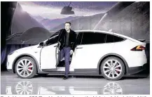  ?? MARCIO JOSE SANCHEZ / ASSOCIATED PRESS 2015 ?? Tesla Motors CEO Elon Musk introduces the high-tech Model X in 2015. A new report says that automotive data could be worth $450 billion to $750 billion globally by 2030.