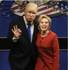  ?? WILL HEATH/THE ASSOCIATED PRESS ?? Alec Baldwin, left, as Republican presidenti­al candidate Donald Trump, and Kate McKinnon as Democratic presidenti­al candidate Hillary Clinton.