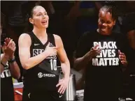  ?? Mary Altaffer / Associated Press ?? Storm guard Sue Bird (10) reacts as fans give her a standing ovation during the final seconds against the Liberty on Sunday in New York.