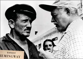  ?? ?? CLASSIC: Spencer Tracy, left and above with Hemingway, starred in the 1958 film version of the 1952 novel The Old
Man And The Sea, left