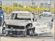  ?? SANJEEV VERMA/HT PHOTO ?? The remains of the car that caught fire near Ullahawas village in Gurgaon on Sunday.