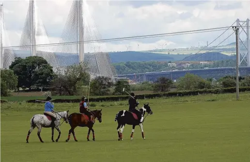  ??  ?? Clockwise from main: a beginners’ lesson at Stewarton Polo Club near South Queensferr­y; Karina Bowlby shows Hope how to strike the ball; in the saddle and ready to play