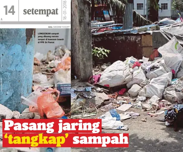  ?? FOTO: SADDAM YUSOFF ?? LONGGOKAN sampah yang dibuang merata tempat di kawasan bawah di PPR Sri Pantai.