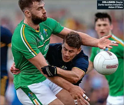  ??  ?? COLLISION: Dayne Zorko tackles Ireland’s Aidan O’Shea