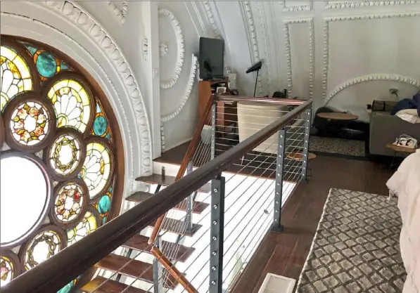  ?? Keller Williams photos ?? A view from the loft of the round stained-glass window.