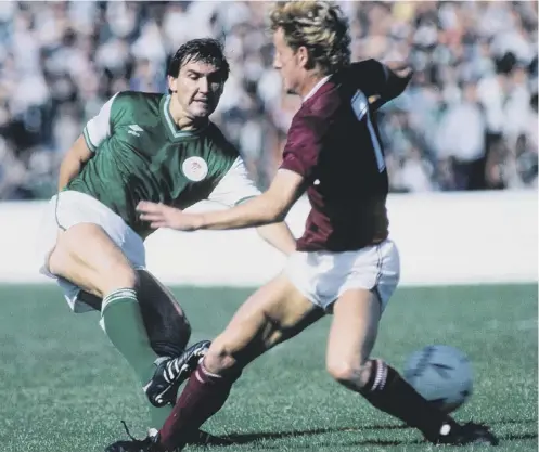  ??  ?? 0 Jackie Mcnamara in action for Hibs as he tussles with Hearts’ Dave Bowman during an Edinburgh derby in 1984.