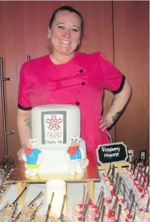  ??  ?? WinSport pastry/sous chef Melanie Hennessy pulled out all the stops for the 30th anniversar­y party at WinSport’s Canada Olympic Park.