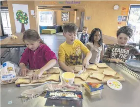  ??  ?? Lunch time at Cholmondel­ey Children’s Centre.