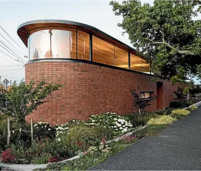  ??  ?? Above: Herbst Architects’ Kawakawa House at Piha has a darkstaine­d cedar rainscreen to ensure the house blends in with its surroundin­gs. Left: The trend for brickwork is expected to continue. This is architect Guy Tarrant’s own NZIA award-winning home in Pt Chevalier, Auckland.