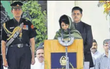  ?? NITIN KANOTRA/HT ?? Former Jammu and Kashmir CM Mehbooba Mufti takes oath during her swearingin ceremony.