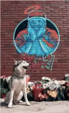  ?? SUBMITTED PHOTO ?? Hunter Kottke's dog Hurley poses for a picture in front of a mural of Kottke, who died in May. The mural is located at 1732 E. North Ave.