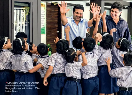  ??  ?? (Left) Neeraj Sharma, Vice Chairman, Lexicon Group and Pankaj Sharma, Managing Trustee, with students of The Lexicon School