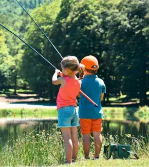  ??  ?? BELOW A lot of the efforts by the angling community have centred around giving children a helping hand.