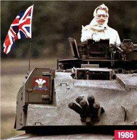  ?? ?? 1986 Twin tracks: Liz Truss rides a British tank in Estonia yesterday ... as Lady Thatcher had on a visit to Germany. The Challenger 2 was flying the Union flag and the Royal Tank Regiment’s banner