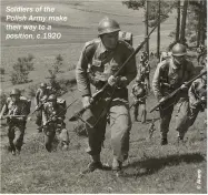  ??  ?? Soldiers of the Polish Army make their way to a position, c.1920