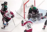  ?? JASON FRANSON/ASSOCIATED PRESS ?? Nazem Kadri of the Colorado Avalanche (91) scores a goal Monday in the first period against Arizona. Kadri had two power-play goals early as the Avs dominated in a 7-1 win.