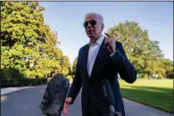  ?? (AP/Andrew Harnik) ?? President Joe Biden speaks to members of the media as he arrives Sunday at the White House in Washington, after returning from a weekend at Camp David.