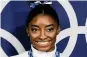  ?? ?? Simone Biles is the most decorated U.S. gymnast, with 32 Olympic and World Championsh­ip medals.