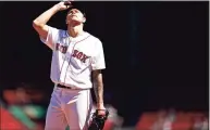  ?? Maddie Meyer / Getty Images ?? The Red Sox’s Tanner Houck reacts during the first inning against the Orioles on Saturday.