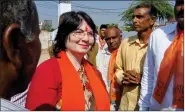  ??  ?? Tejashree Patel with BJP workers.