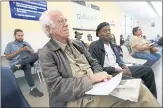  ?? JANE TYSKA — STAFF ARCHIVES ?? Elliott Currie, left, and Larry Bullock, both of Berkeley, wait their turn at the Claremont Avenue DMV office in Oakland in May. Currie had been waiting for six hours.