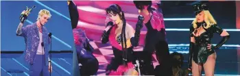  ??  ?? Machine Gun Kelly accepts the award for best alternativ­e song.
Camila Cabello performs ‘Don’t Go Yet’ at the MTV Video Music Awards.
Madonna performs at the MTV Video Music Awards.