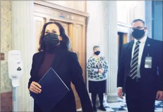  ?? Liz Lynch / Getty Images ?? Vice President-elect Kamala Harris arrives at the U.S. Capitol to vote on Friday in Washington. The Senate voted to pass the National Defense Authorizat­ion Act and override President Trump’s veto for the first time during his presidency.