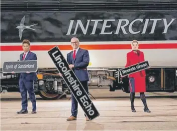  ??  ?? LNER colleagues with nameplates beside the record-breaking Class 43 power car 43102 (photo: Charlotte Graham)