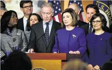  ?? T.J. Kirkpatric­k / New York Times ?? House Speaker Rep. Nancy Pelosi, D-Calif., and other House members announce a deal on the USMCA.