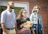  ?? COURTESY MIDDLESEX COMMUNITY COLLEGE ?? Middlesex Community College students Daniel Ortiz, Gilianne Oyolo and Marina Capezzone sang “This Land is Your Land” at the school’s recent CommUNITY event.