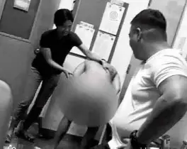  ??  ?? THEY CAN’T LAUGHNOW The now viral video of this scene is spelling trouble for some members of the Makati police antidrug unit, more than a year after it was taken.