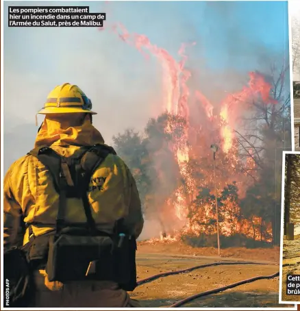  ??  ?? Les pompiers combattaie­nt hier un incendie dans un camp de l’armée du Salut, près de Malibu.