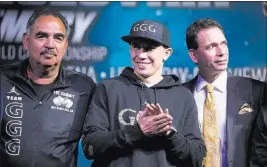  ?? Erik Verduzco ?? Las Vegas Review-journal @Erik_verduzco Gennady Golovkin, center, with his trainer Abel Sanchez, left, and his promoter Tom Loeffler, during a news conference at the MGM Grand.