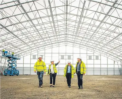  ?? Picture: Steve MacDougall. ?? Getting a tour of the new indoor football facility in Glenrothes are, from left: site manager Rory Waite, Sharon Johnstone, area manager for Fife Sports and Leisure Trust, architect John Purves and Andy MacLelland, sports partnershi­p manager.