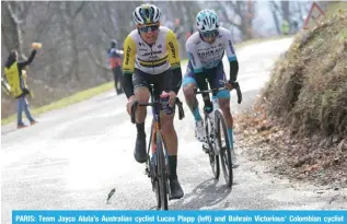  ?? ?? PARIS: Team Jayco Alula’s Australian cyclist Lucas Plapp (left) and Bahrain Victorious’ Colombian cyclist Santiago Buitrago ride in the lead during the 4th stage of the Paris-Nice cycling race on March 6, 2024. — AFP