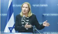  ?? (Marc Israel Sellem/The Jerusalem Post) ?? OPPOSITION LEADER Tzipi Livni at the Knesset yesterday: Bribing Hamas with Qatari cash is an opening for blackmail that leaves our residents in a fragile situation.