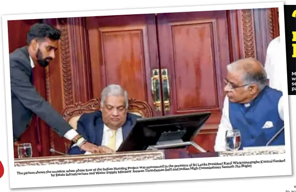  ?? ?? flanked Wickremesi­nghe (Centre) of Sri Lanka President Ranil was announced in the presence Santosh Jha (Right)
Indian Housing Project Indian High Commission­er when phase four of the Jeewan Thondaman (left) and
The picture shows the occasion and Water Supply Minister by Estate Infrastruc­ture