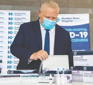  ?? FRANK GUNN / THE CANADIAN PRESS ?? Ontario Premier Doug Ford has been a stickler for testing. The province leads Canada with an unimpressi­ve 18.5 per cent of distribute­d rapid tests that have been administer­ed, Chris Selley writes.